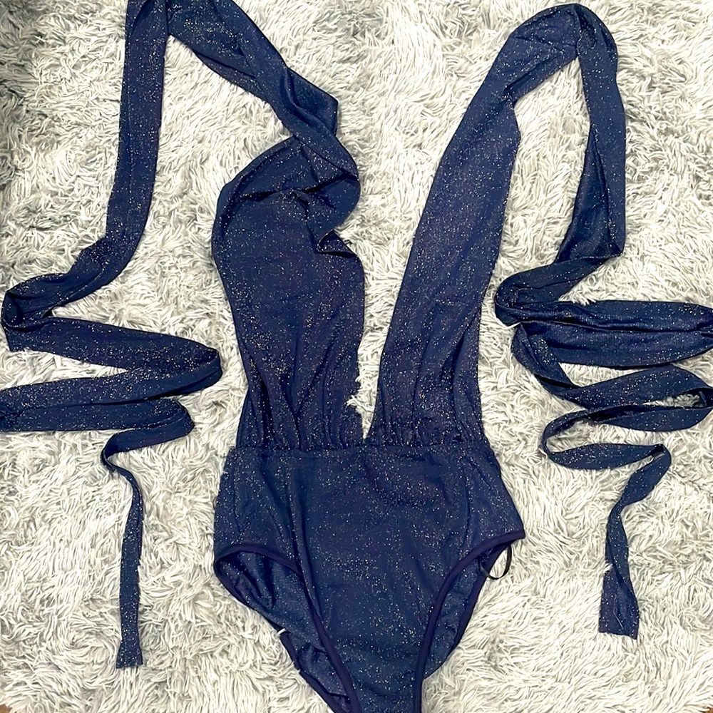 Multi style wrap body suit.